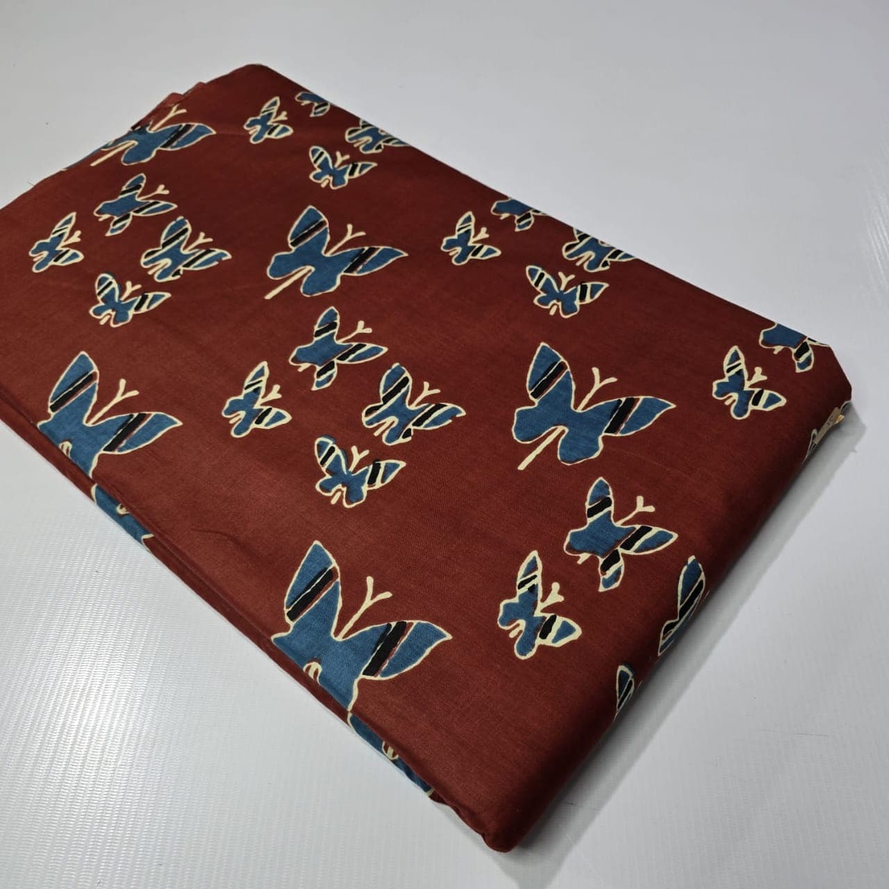 Butterfly Print Cotton — Rust